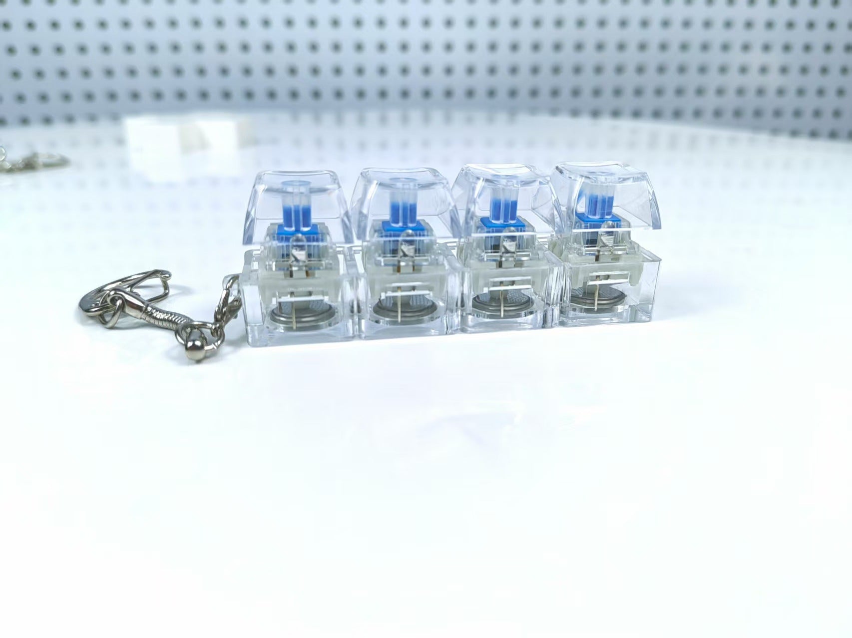 Key cap stress relief toy with LEDS