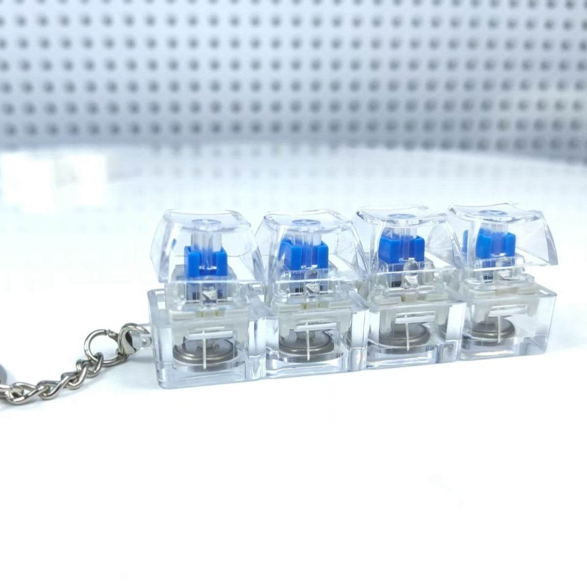 Key cap stress relief toy with LEDS