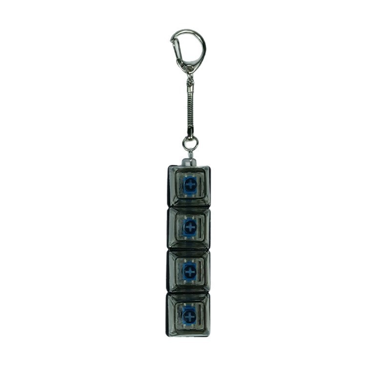 Key cap stress relief toy with LEDS