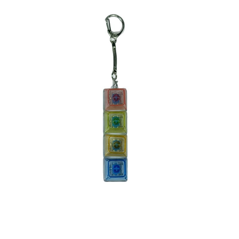 Key cap stress relief toy with LEDS